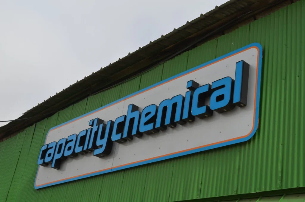 Photograph of the Capacity Chemical building sign saying "Capacity Chemical"